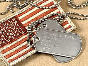 Embroidered American flag with US Armed Forces dog tags - Megan N. Bowker helps with veteran's benefits
